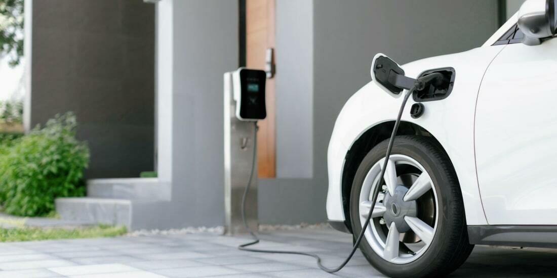 An EV charging at a home charger