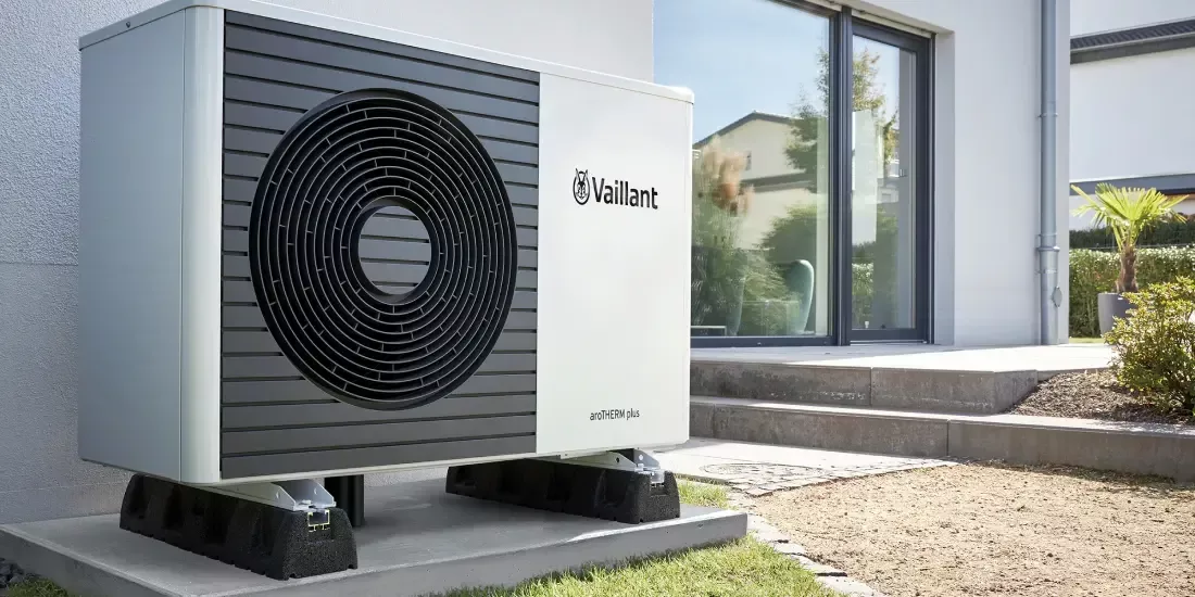 An aroTHERM heat pump from Vaillant outside a modern home