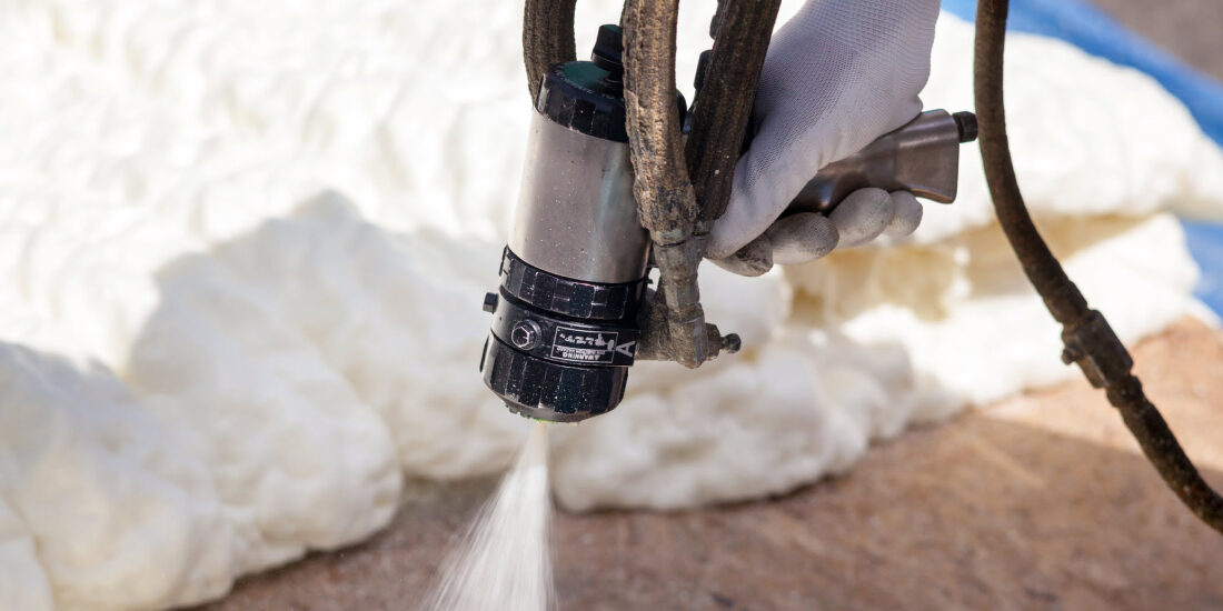 Close up of spray foam insulation gun